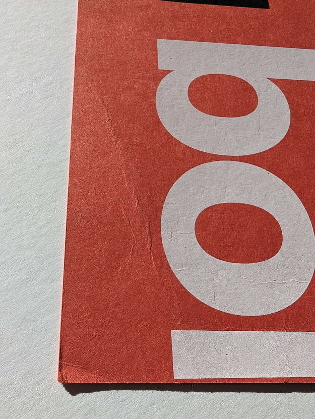 be bold print showing damage to the corner of the print