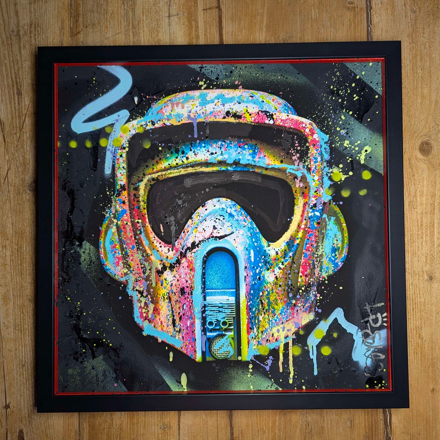 black frame with painted slips, starwars style graffiti helmet, printed on black then hand embellished by lp edits, framed in black frames with painted slips