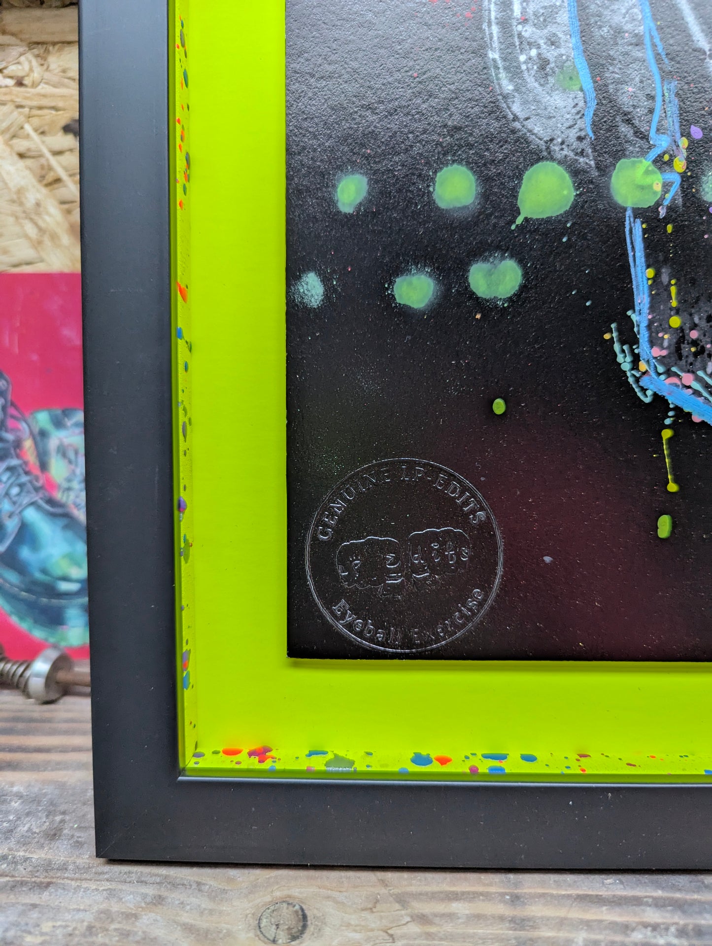 smooth black frame, neon mount with splatter slips, has the genuine LP edits fist bump stamp
