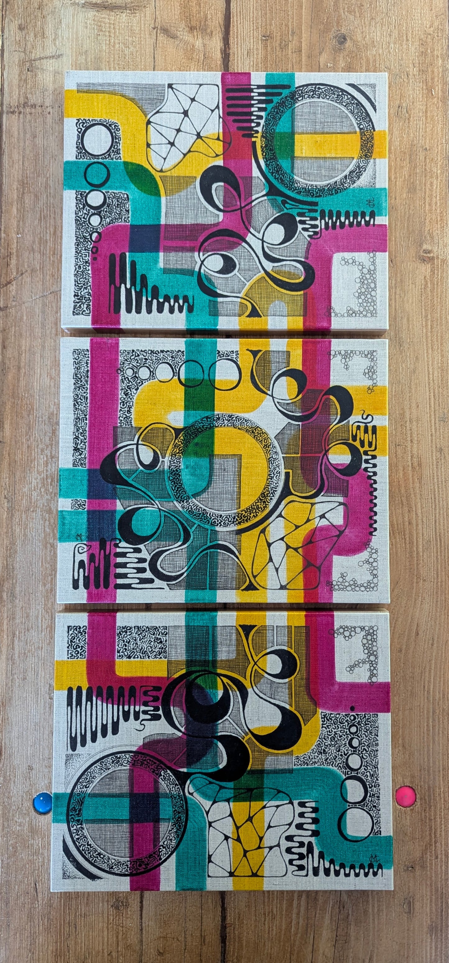 Colourful abstract design on a wooden surface