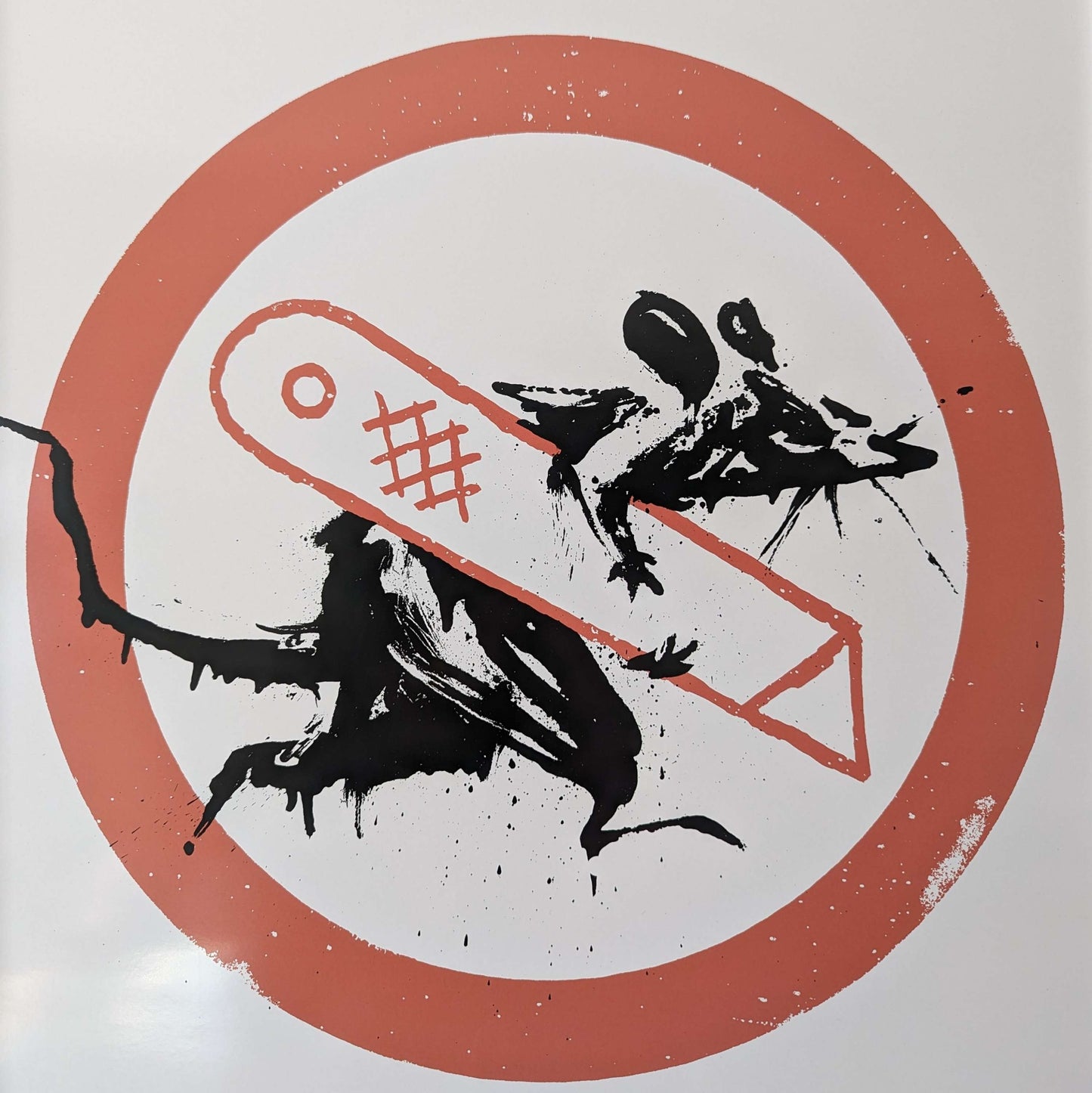 rat holding a stanley knife in red circle
