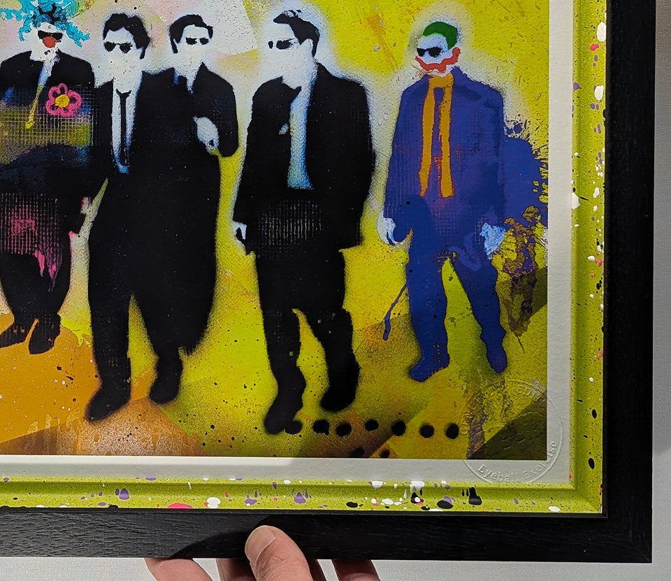 close up lp edits artwork, mashing up reservoir dogs and clowns in a splatter paint style, background of image is yellow and green, framed in a black frame, frame has slips that are shaped with a lip, they have been painted in a similar colour and had paint splatted on them photo on white background