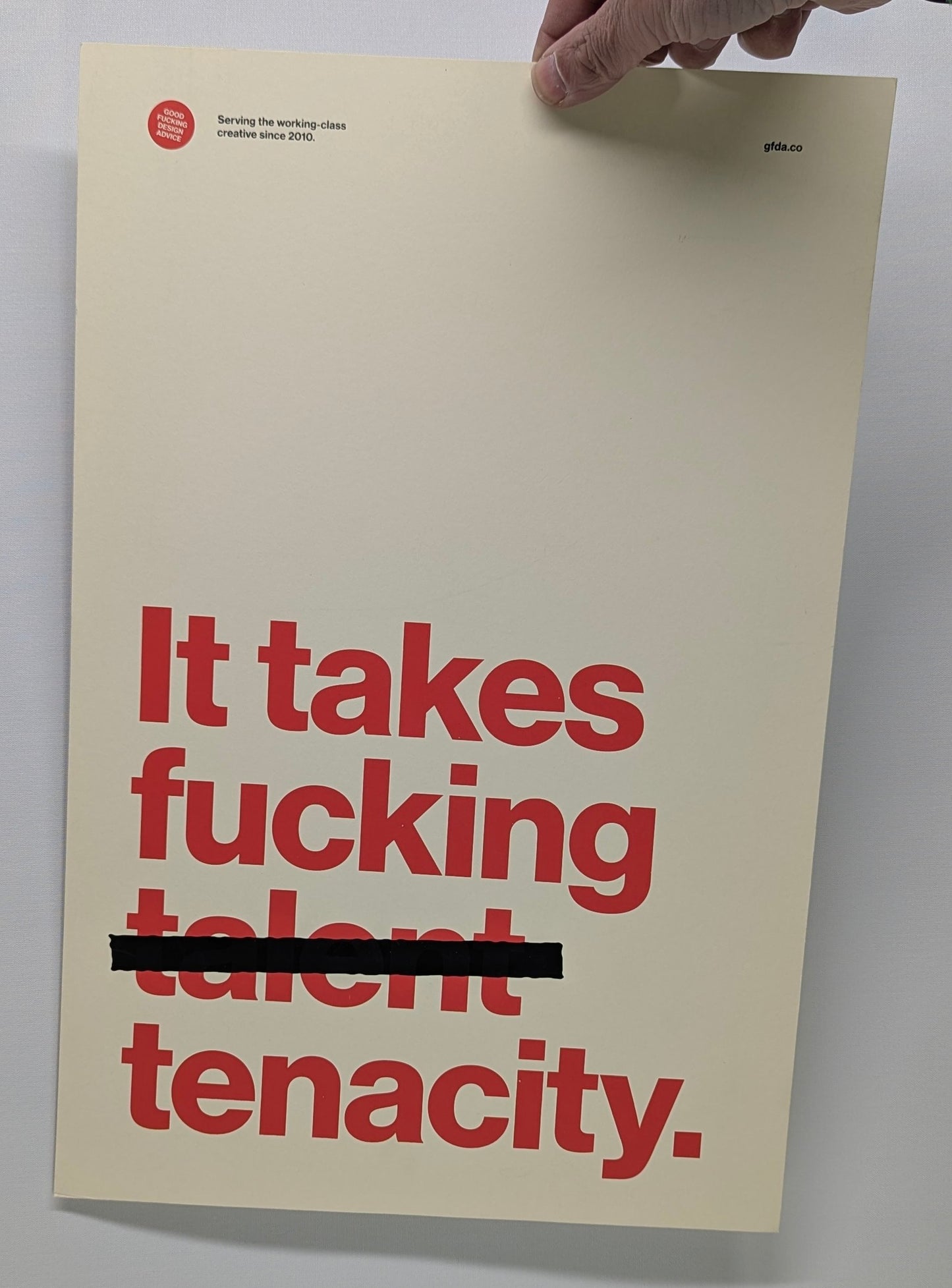 gfda poster red text on cream paper states "it takes fucking (talent crossed out) tenacity