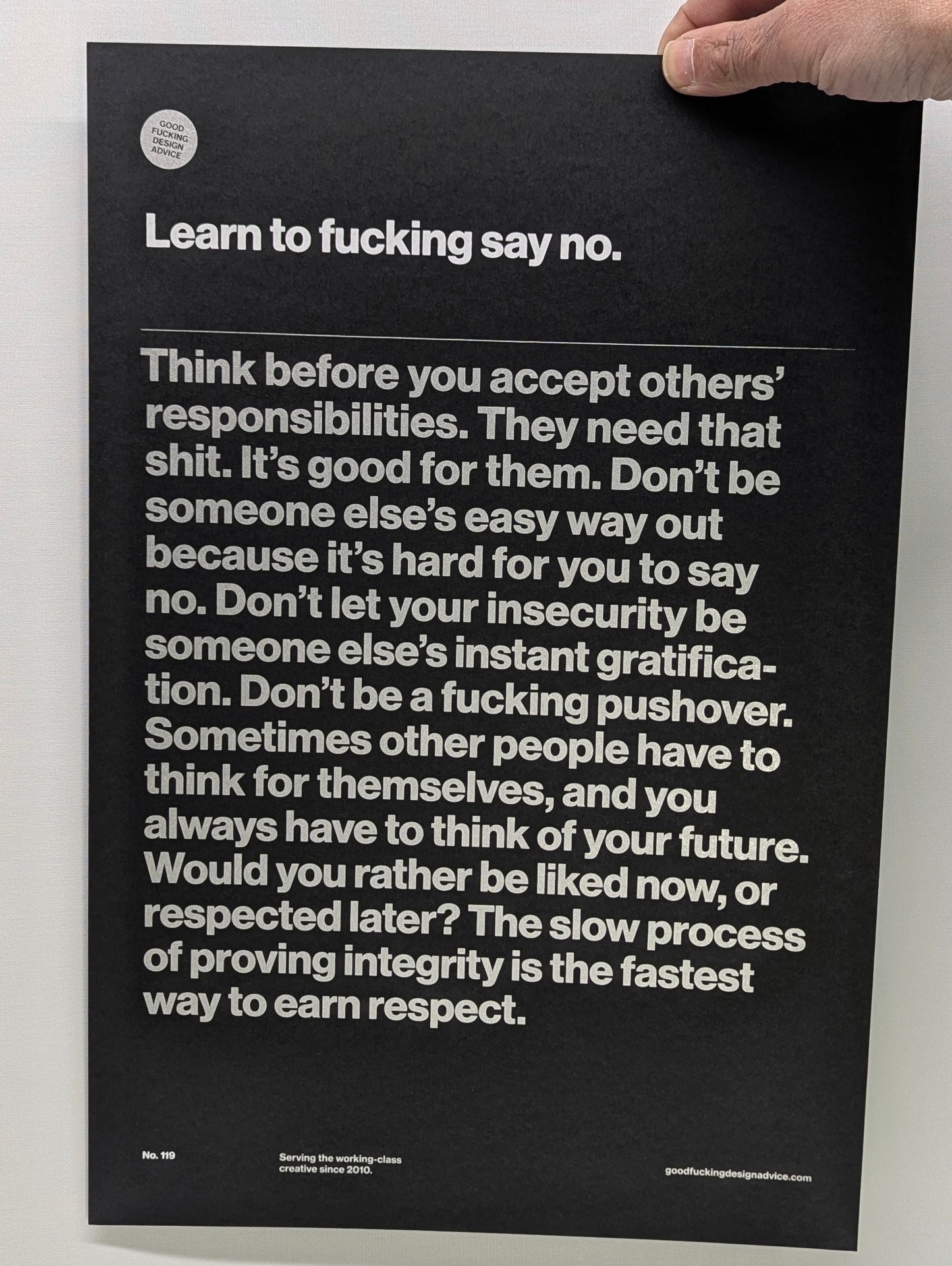 good fucking design advice learn to fucking say no print, silver text on black paper, the text has swear words