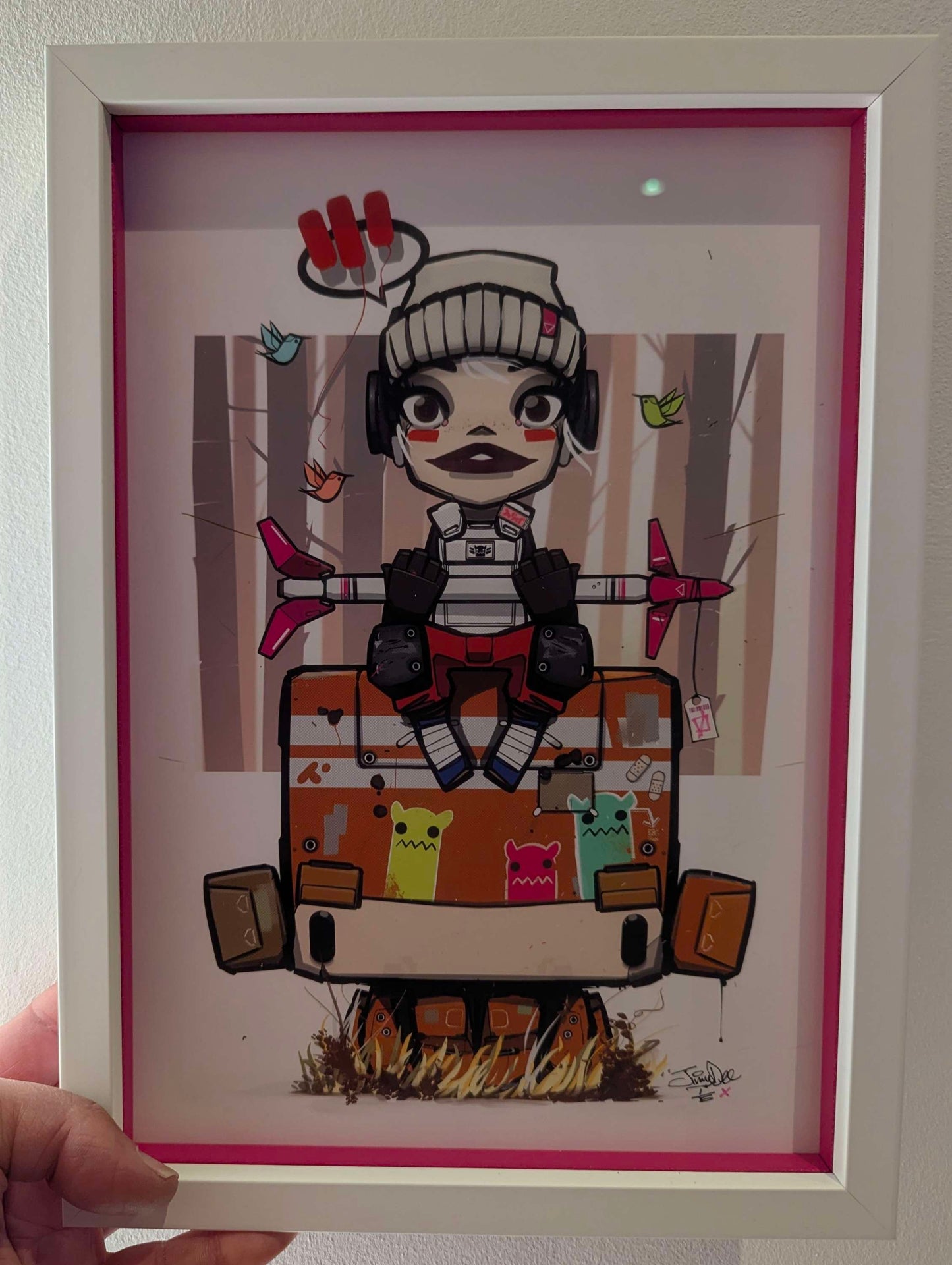 anime character sat on an orange robot holding a rocket, the character is wearing a grey wool hat and has red makeup, picture is at an angle showing the colour slips, being held for scale