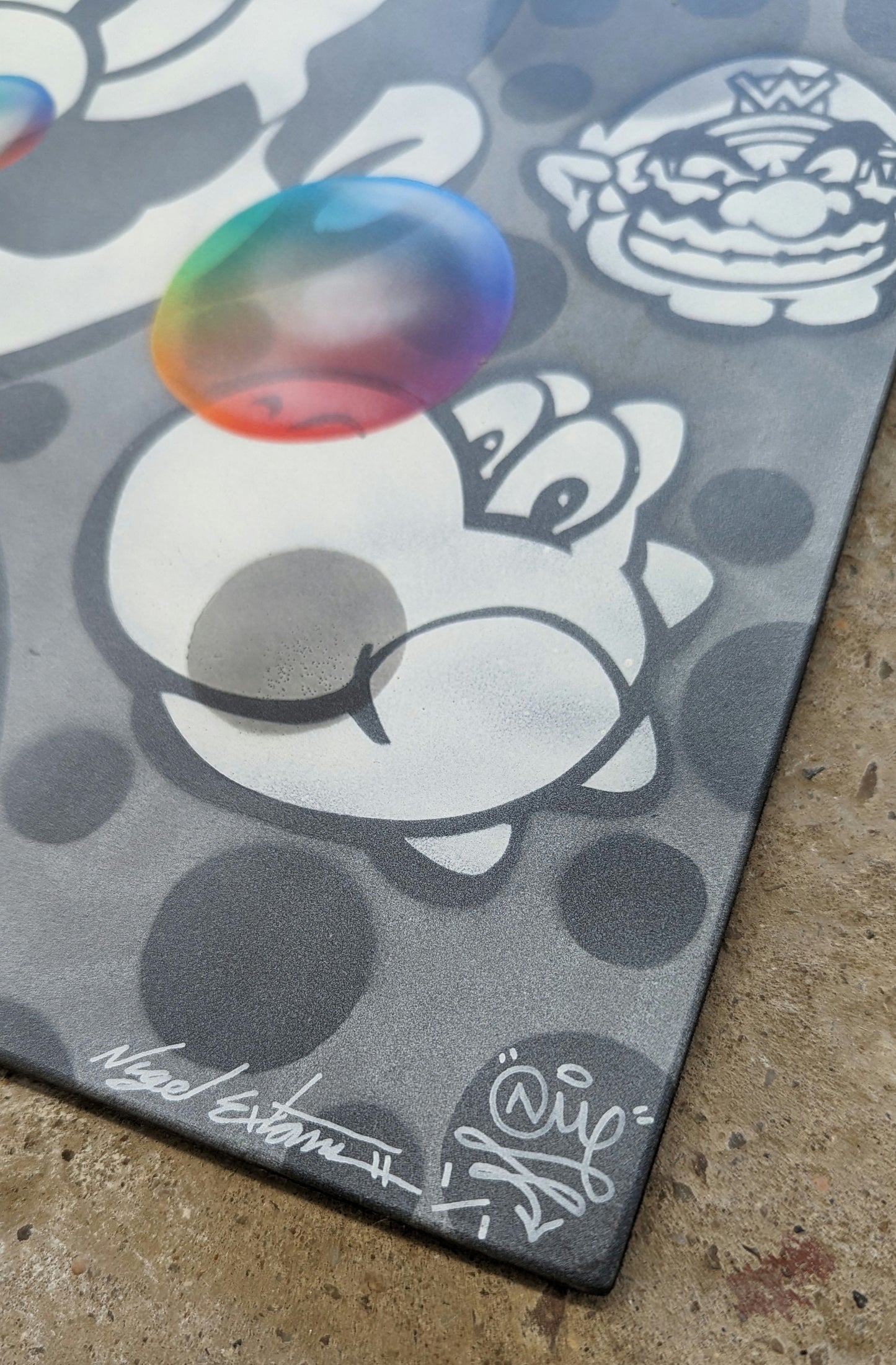 close up of nme super mario character yoshi on concrete background