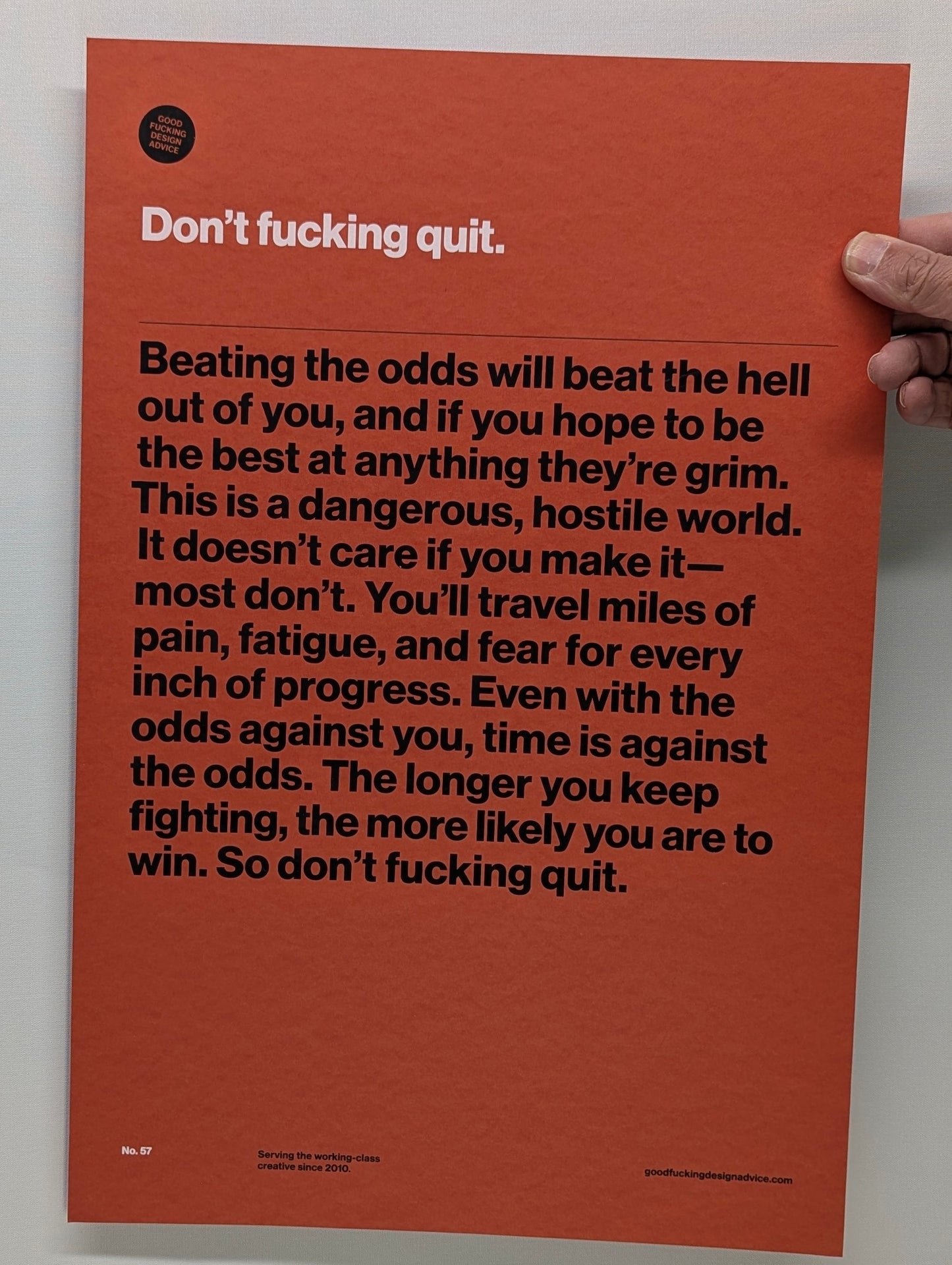 good fucking design advice "Don't fucking quit" print, Black text on red paper, the text states beating the odds