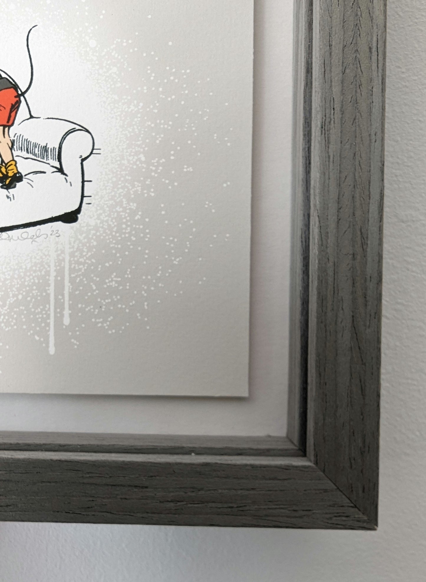 ARTWORK FLOAT MOUNTED IN A GREY WOOD PICTURE FRAME WITH GREY WOOD GRAIN INTERNALS TO CREATE A BOX FRAME.