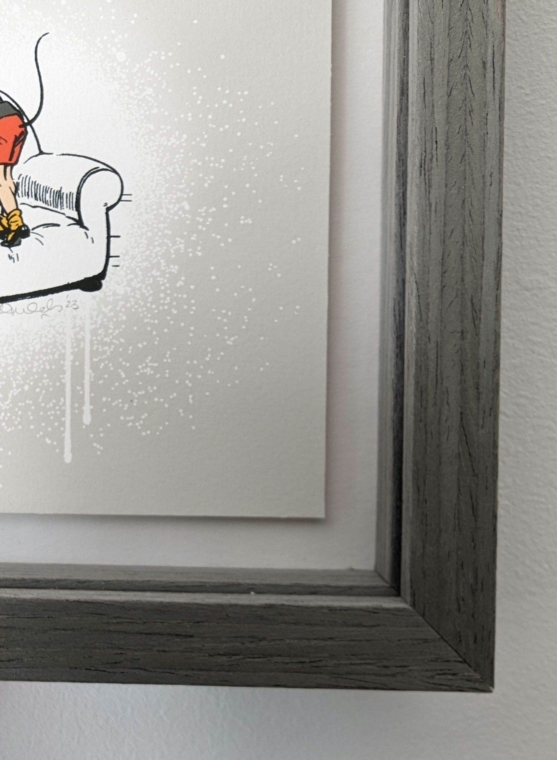 ARTWORK FLOAT MOUNTED IN A GREY WOOD PICTURE FRAME WITH GREY WOOD GRAIN INTERNALS TO CREATE A BOX FRAME.