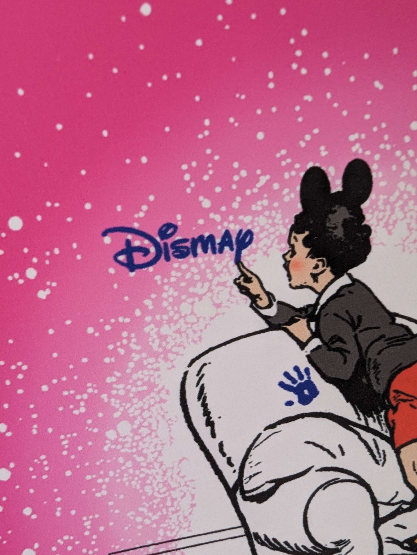 DISMAY DISNEY SIGN BEING PAINTED