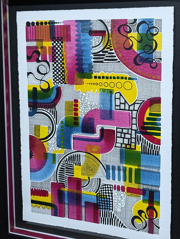Close up of colourful doodle shades of pink, blue, yellow and black. artwrok is floated on black and has colourful matching slips artwork by clare capper.