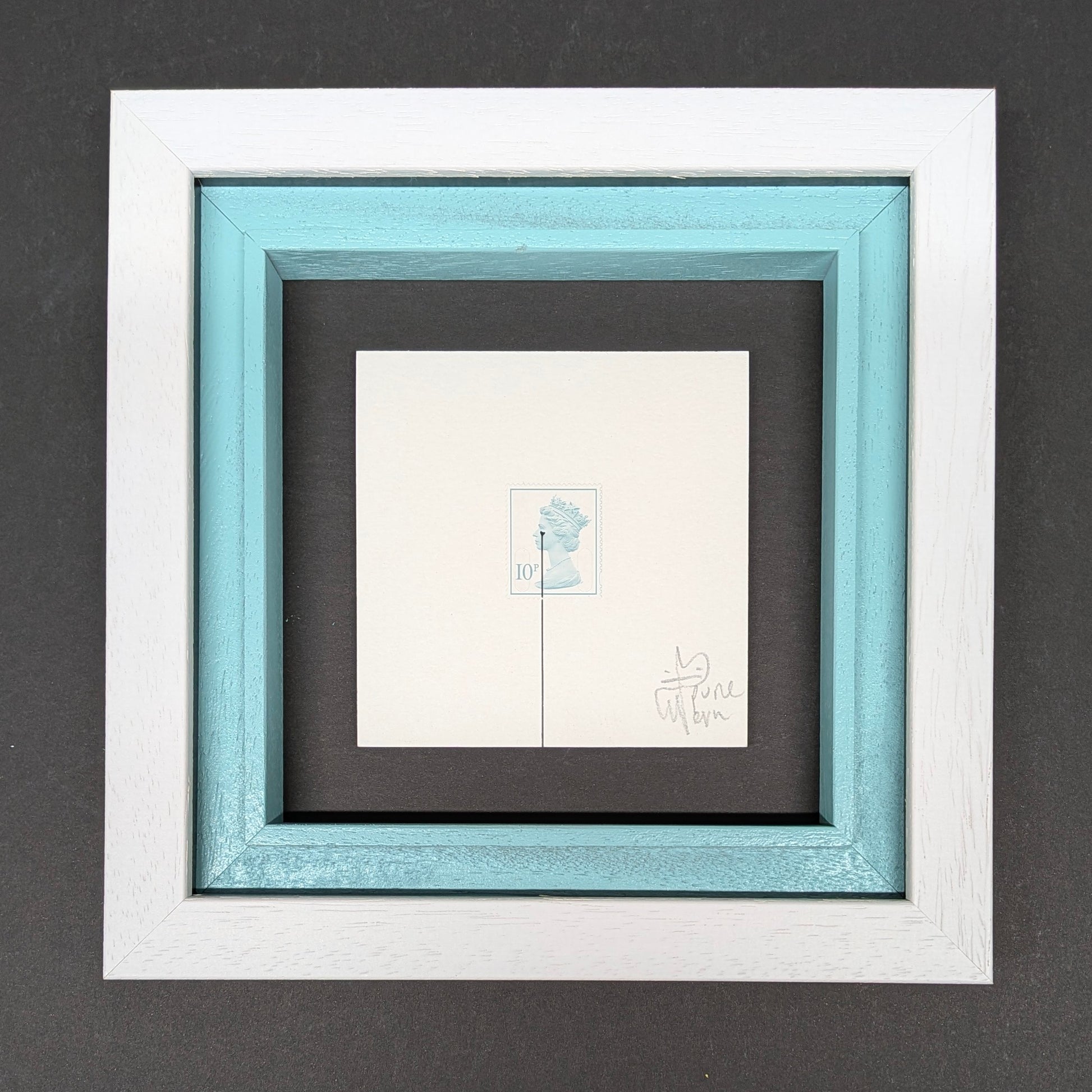 Framed pure evil queen stamp artwork with a white border and black mat on a gray background