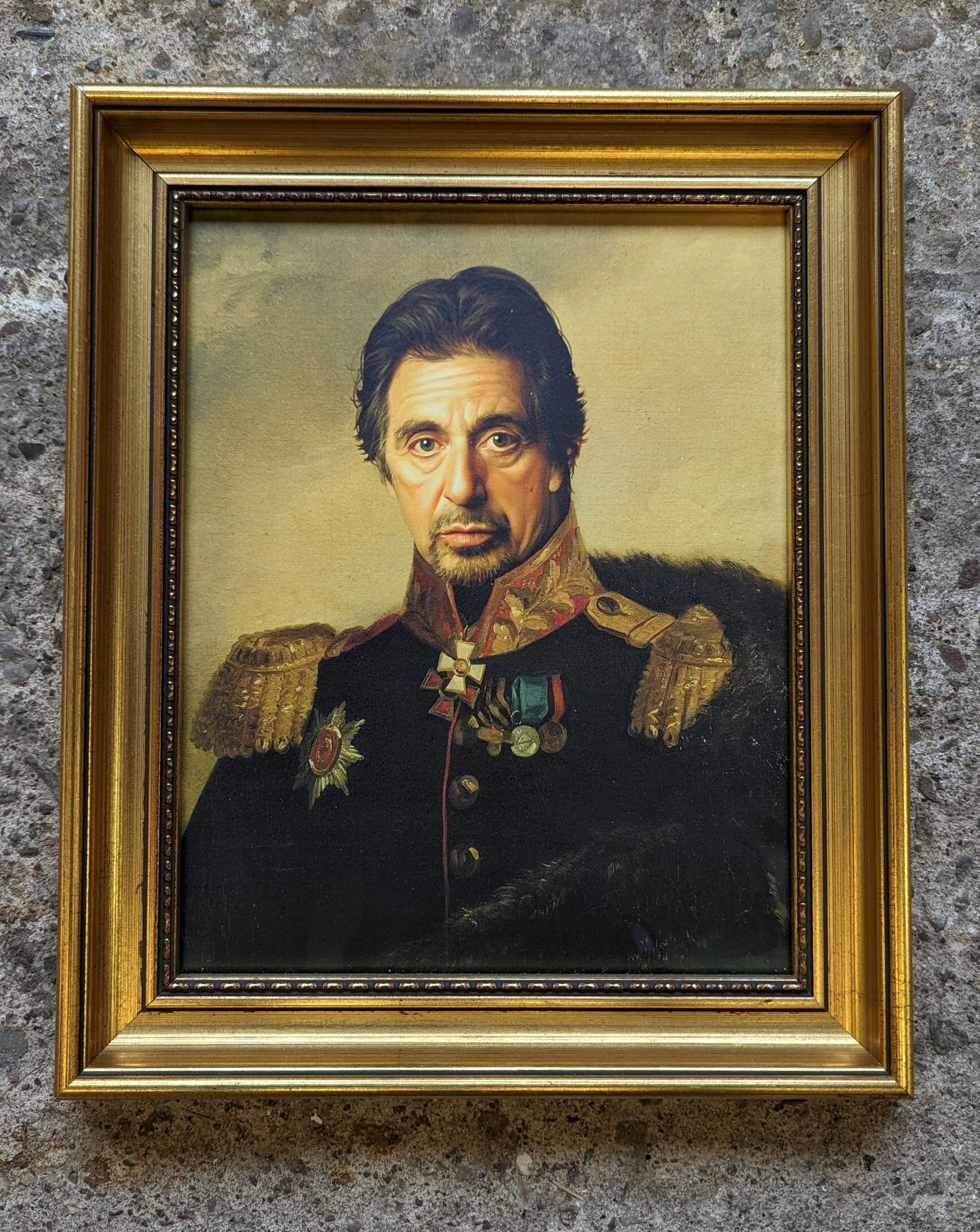 Al pacino in old war costume, framed in an ornate gold frame