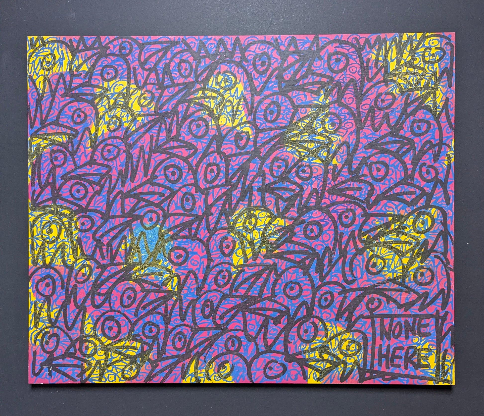 Colorful abstract artwork with 'none Here' text on a black background