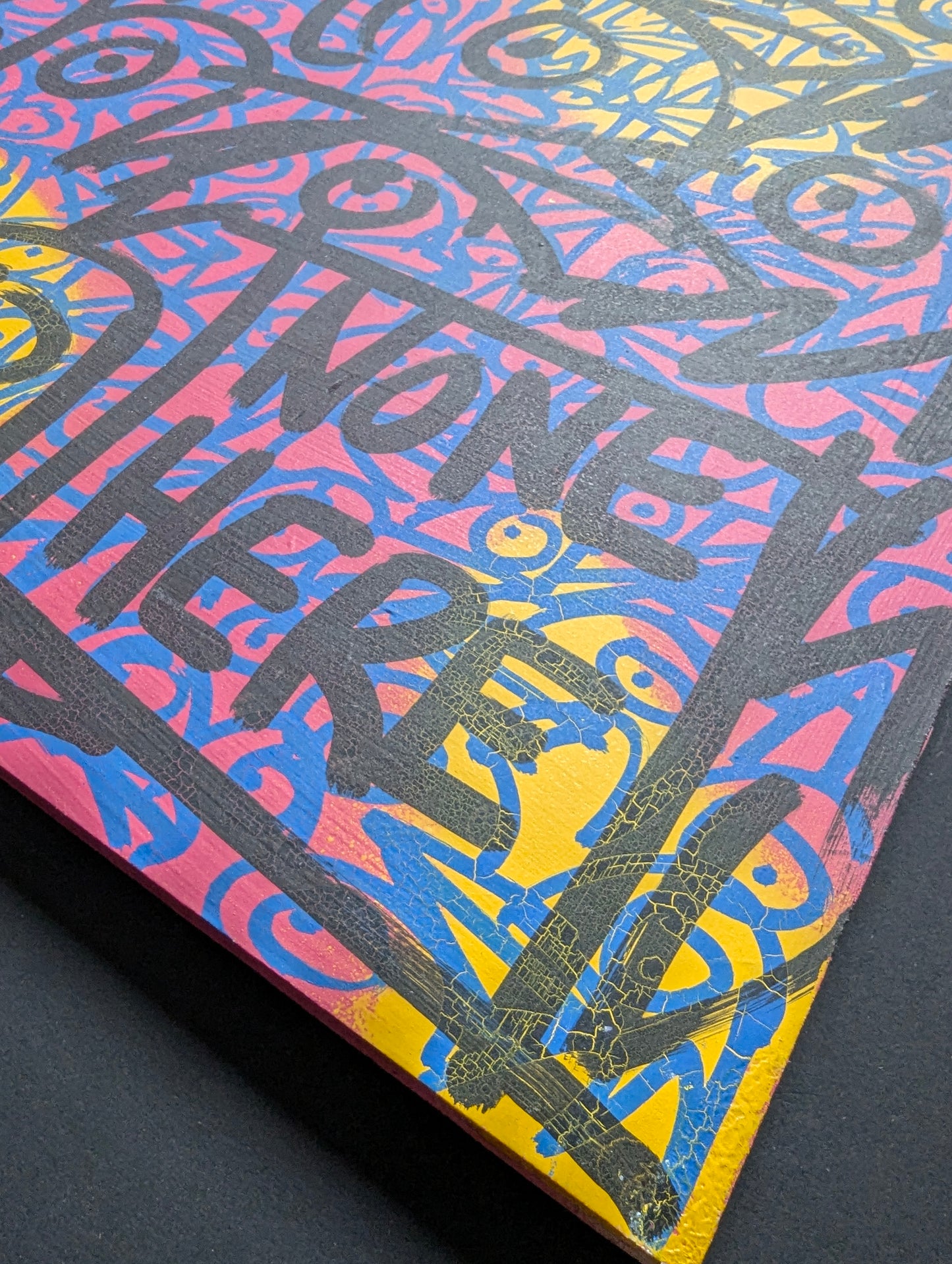 Colorful book cover with abstract design and text on a dark background