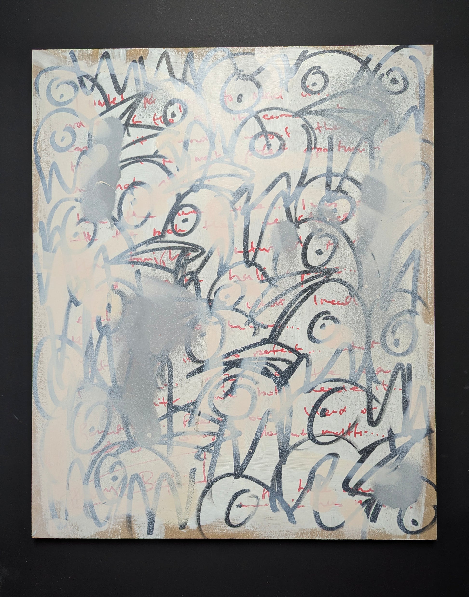 Doodle bird heads black and red pen on white board, black background 