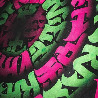 close up of disco biscuit pink and green neon