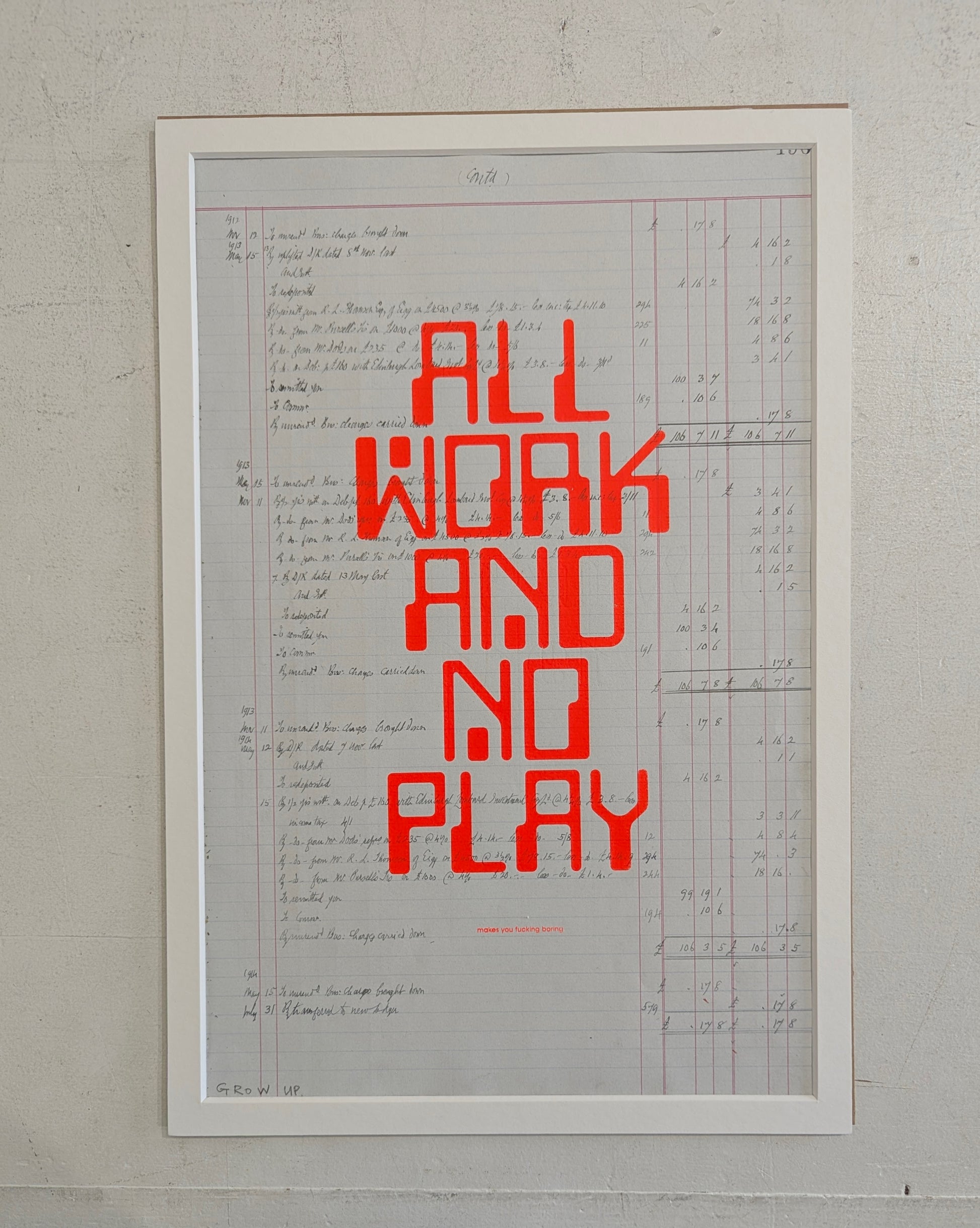 Framed poster with red text 'ALL WORK AND NO PLAY' on a light background