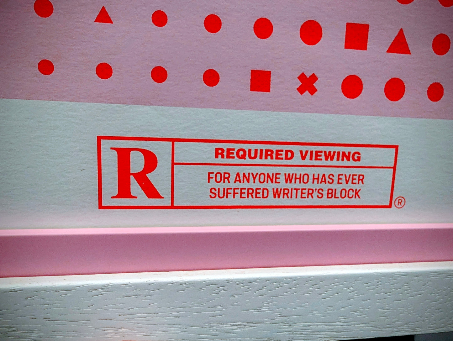 Card with red text and symbols on a white background