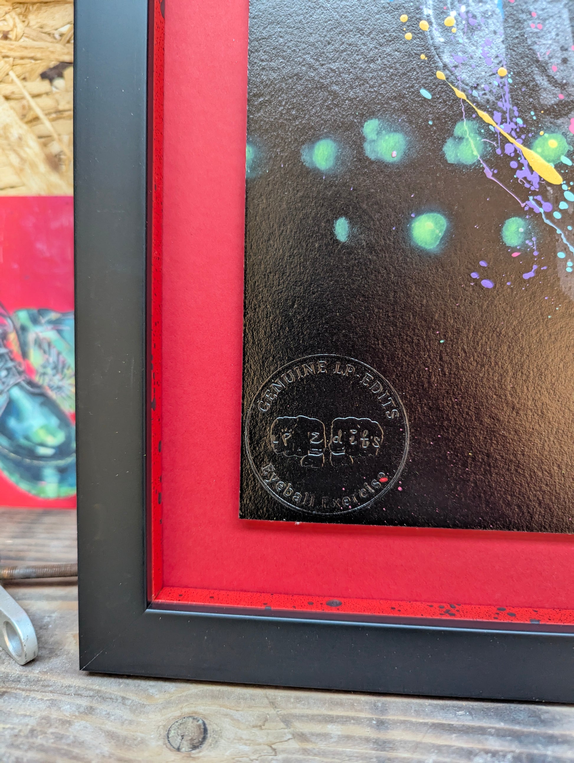 smooth black frame, red mount with splatter slips, has the genuine LP edits fist bump stamp