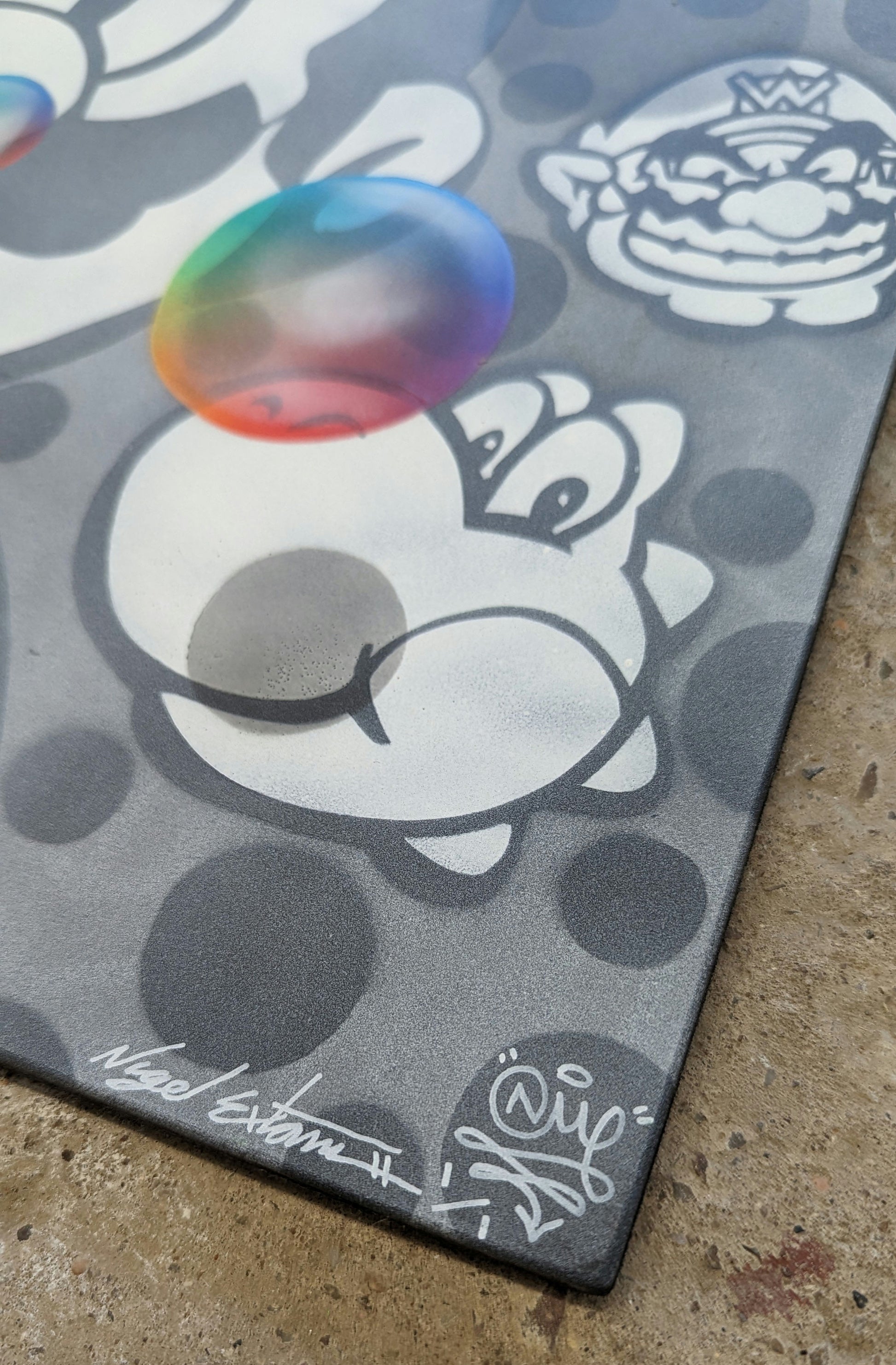 close up of nme super mario character yoshi on concrete background