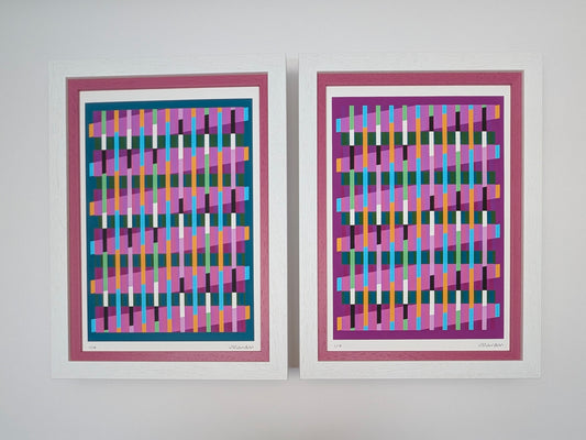Two framed abstract artworks with colorful geometric patterns on a white wall.