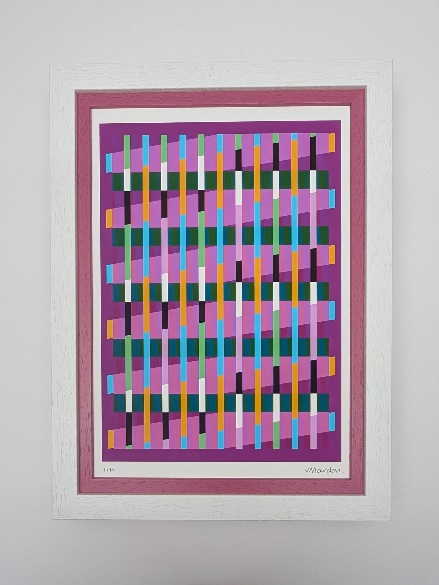 Framed abstract artwork with geometric pattern on a white background