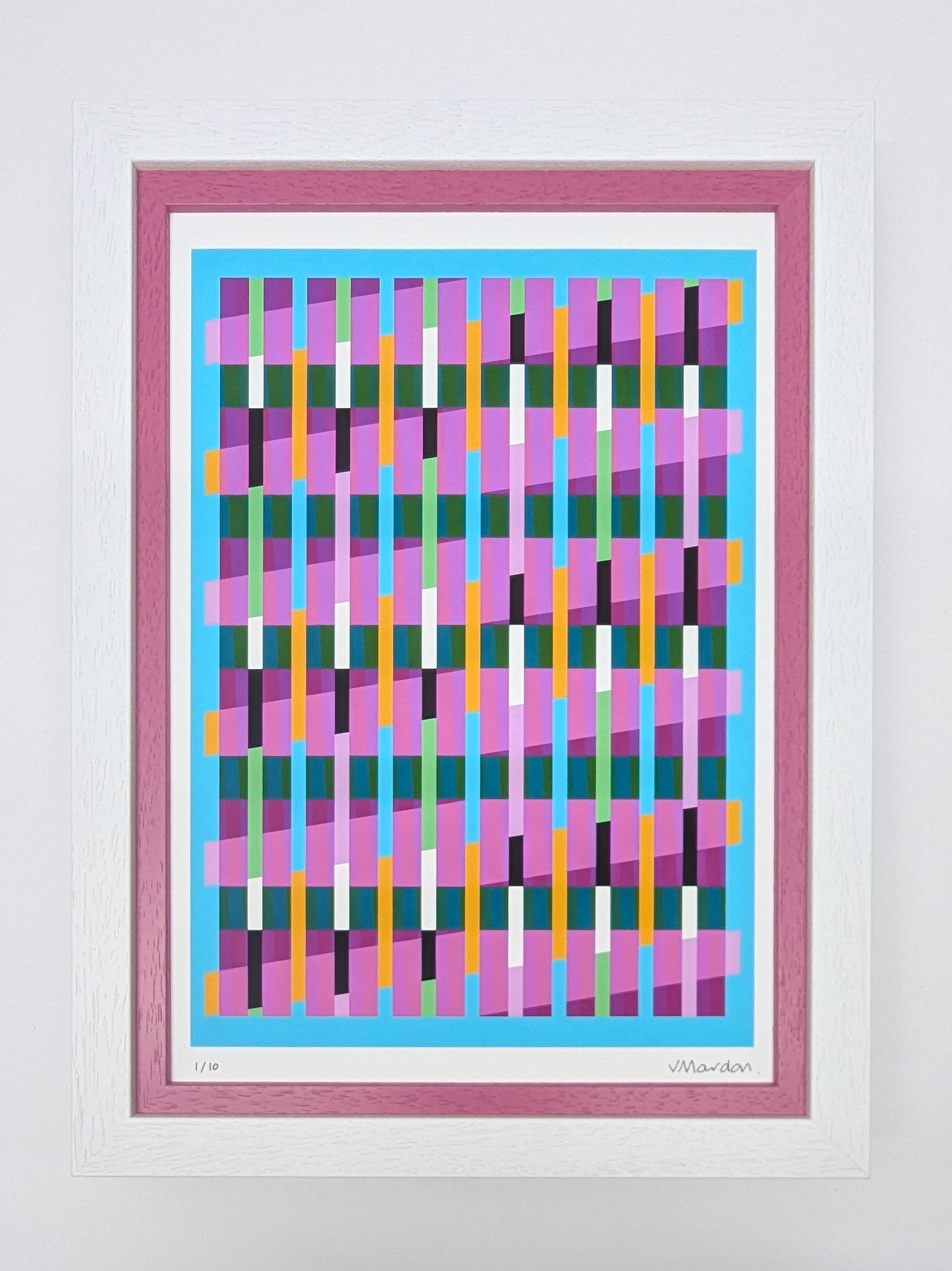 Framed abstract artwork with colorful geometric design on a light gray background